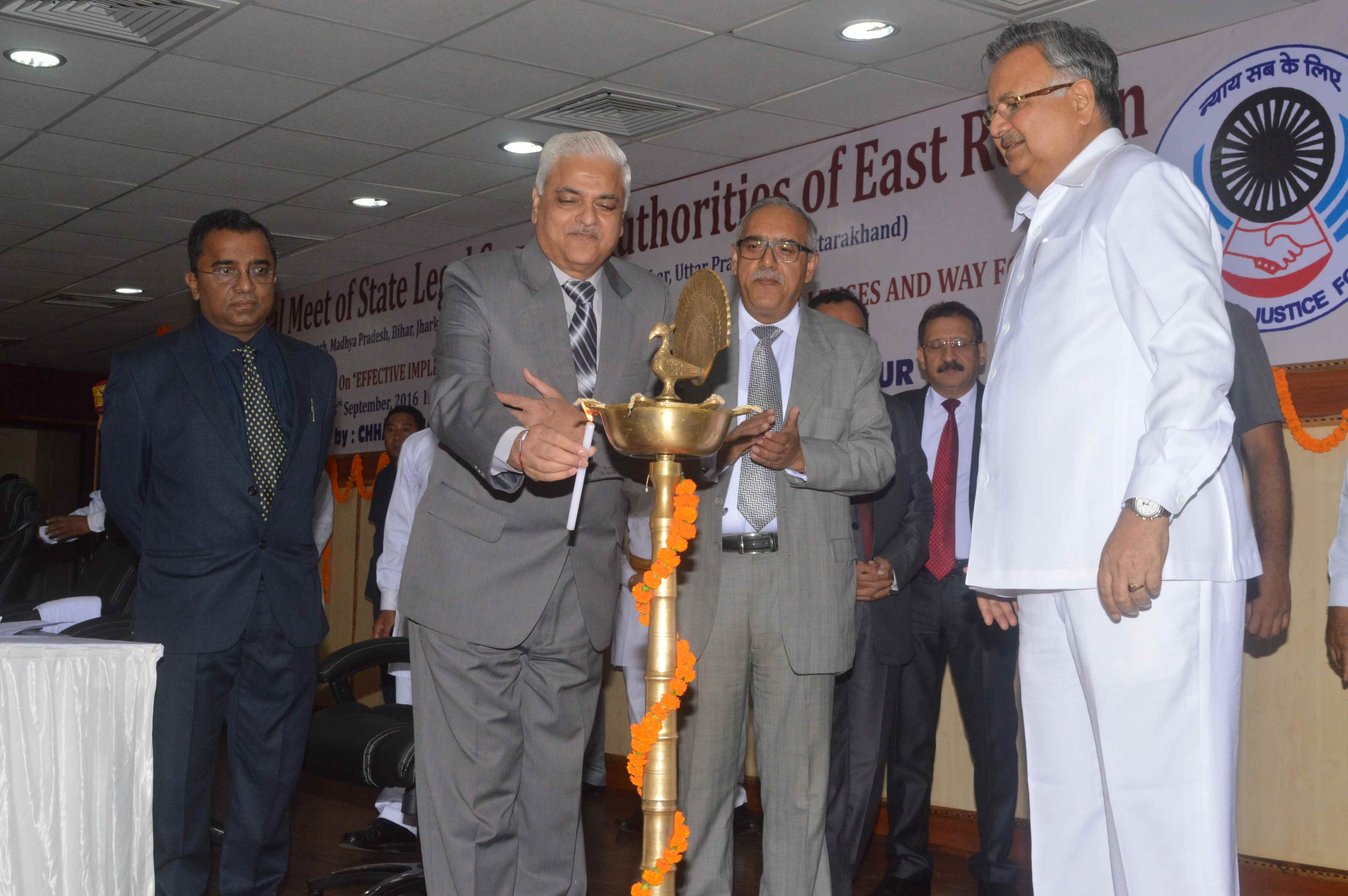 Justice A.K. Dave Lighting the Lamp